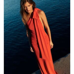 Zara, backless red dress with bow.